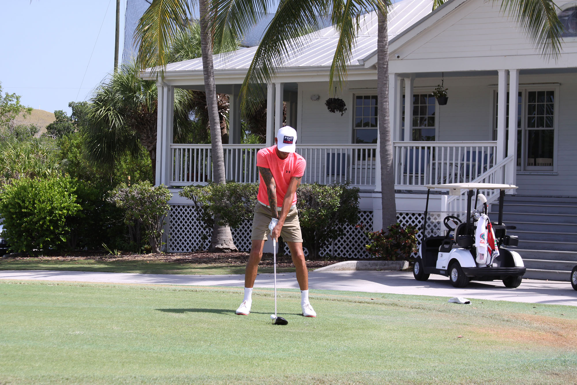 Key West Golf Course person lining up with driver